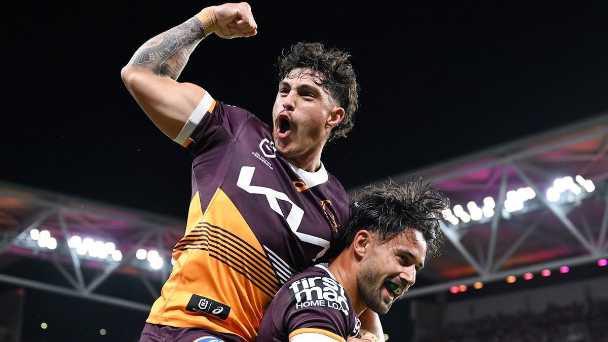 Broncos celebrating at Suncorp Stadium