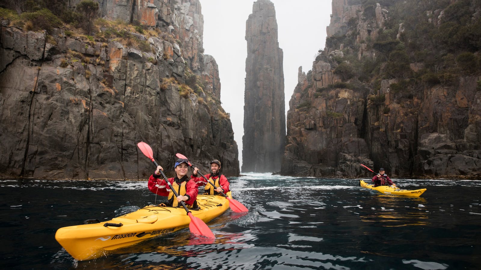 Kayaking beside the Totem Pole on the Tasman Peninsula