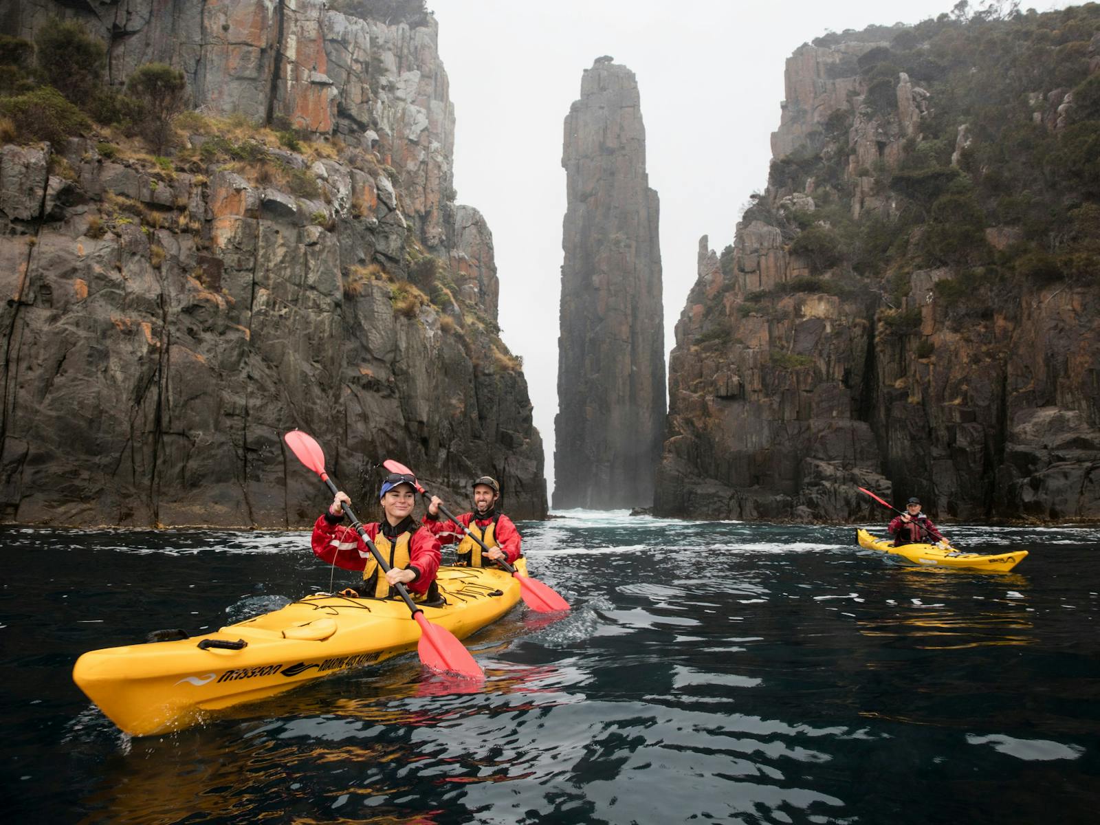 Kayaking beside the Totem Pole on the Tasman Peninsula