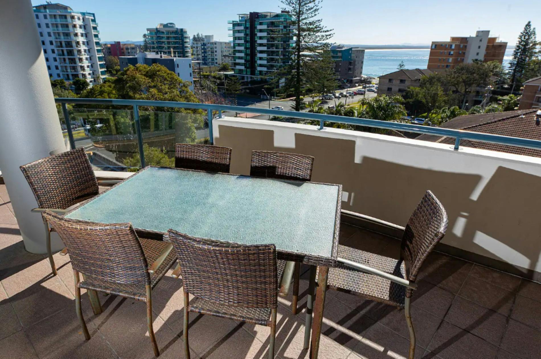Balcony with views and dining setting