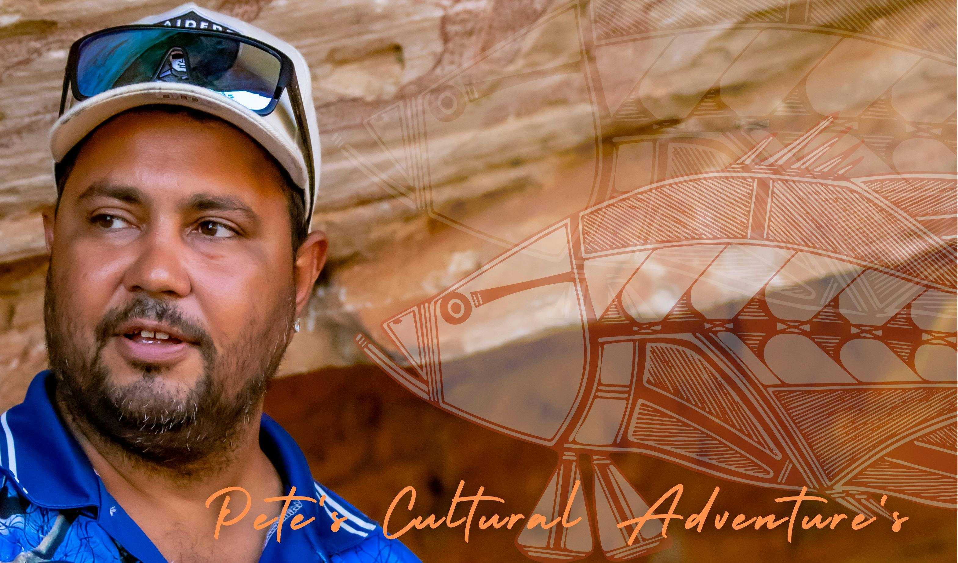 Peter standing infront of rock art explaining the history and stories.