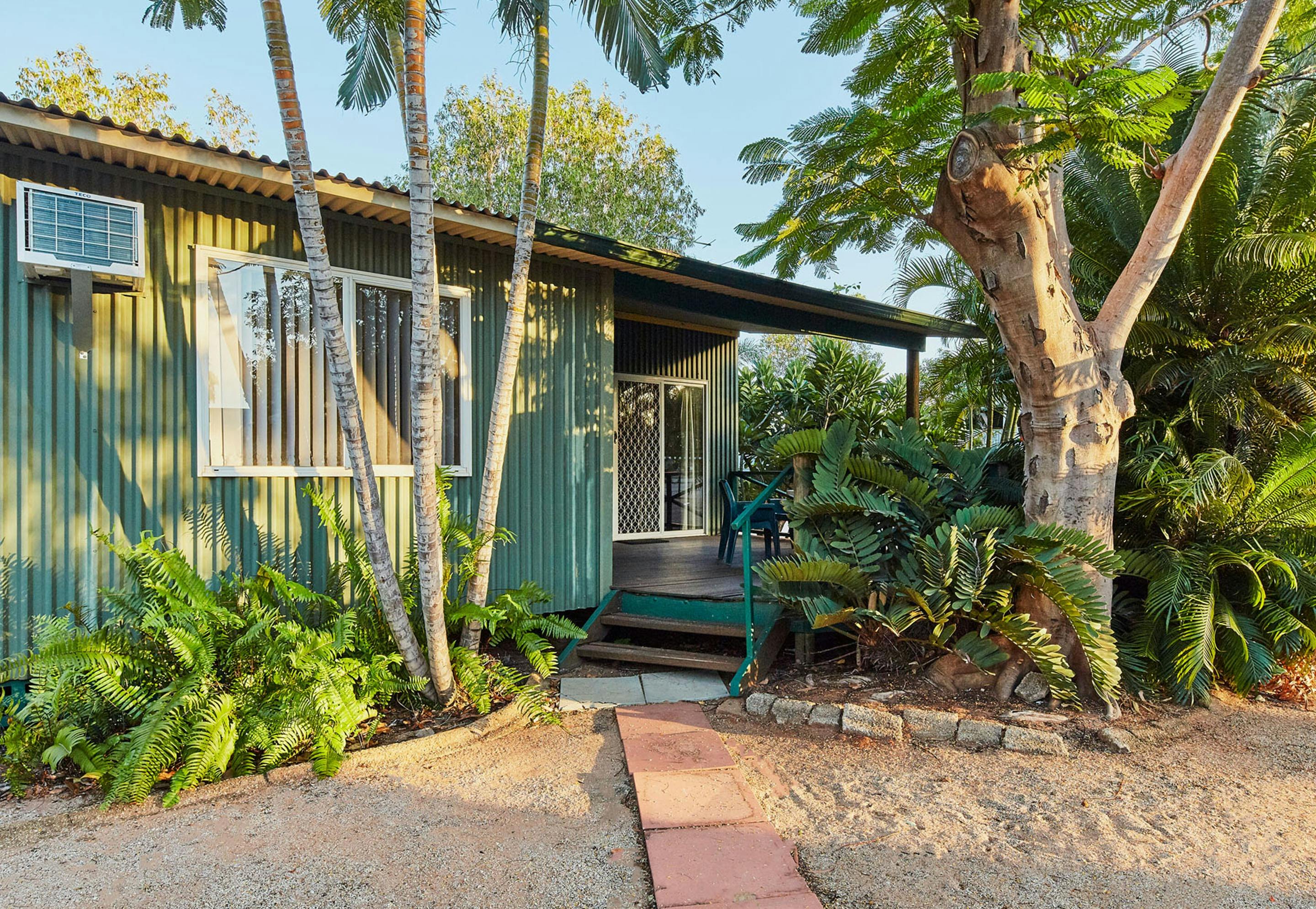 Cabin surrounded by tropical gardens