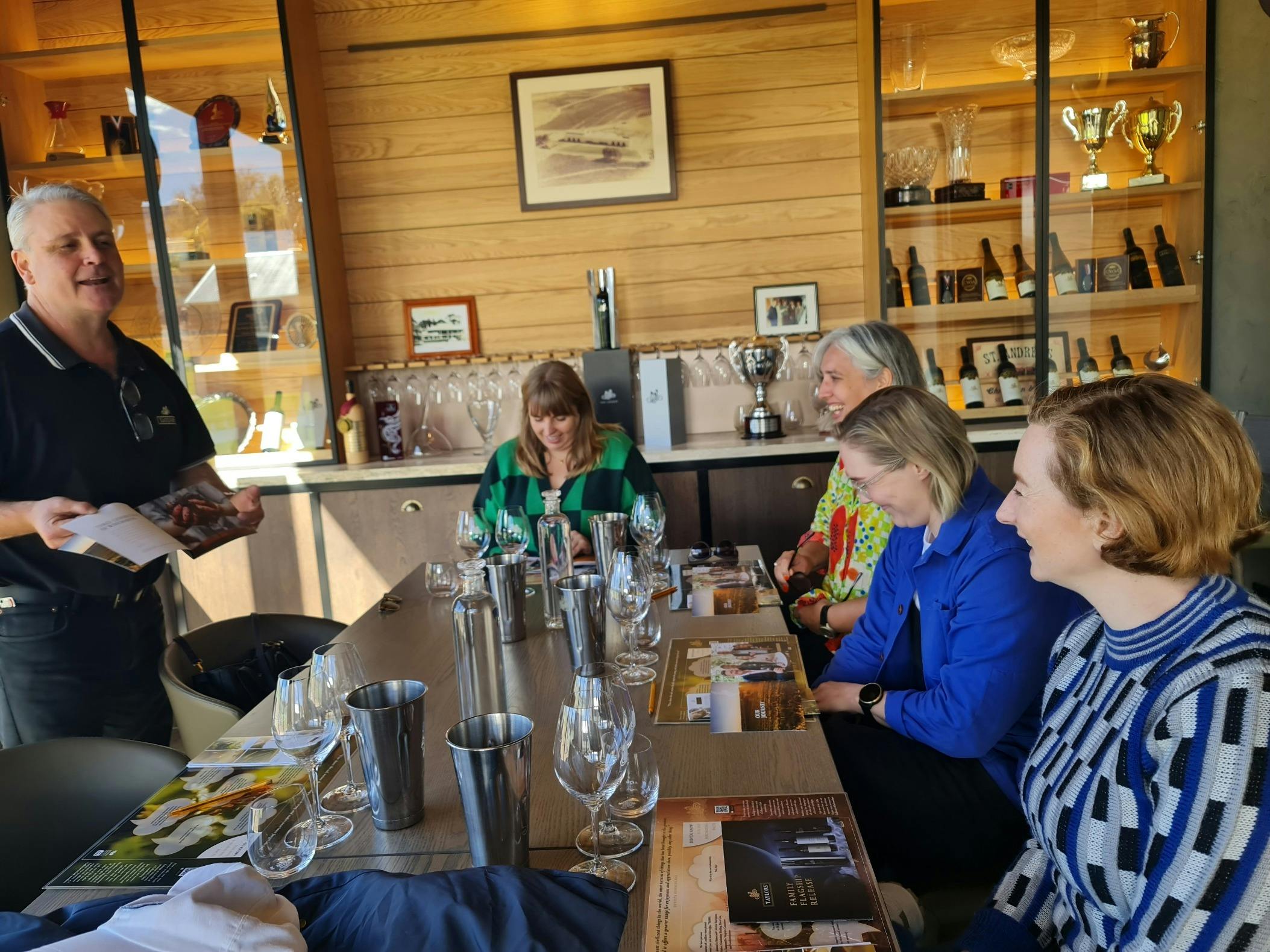A group doing wine tasting at Taylors Winery