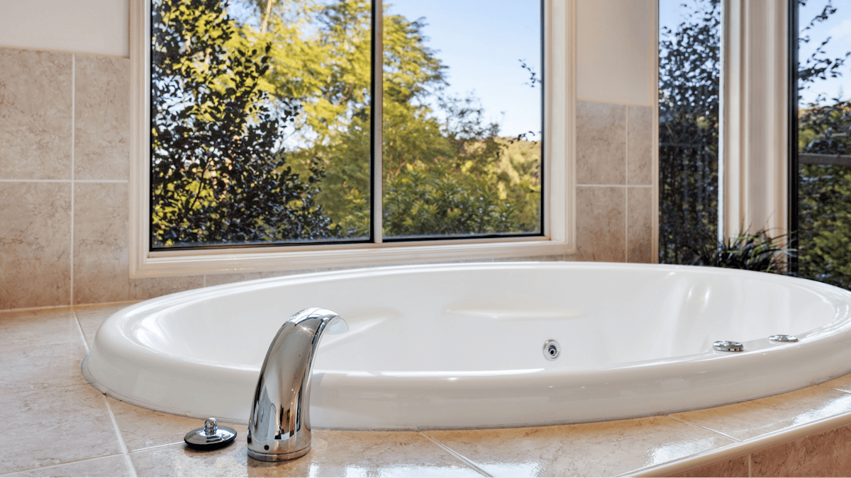 Spa in the bedroom - indulge while enjoying the valley and forest views