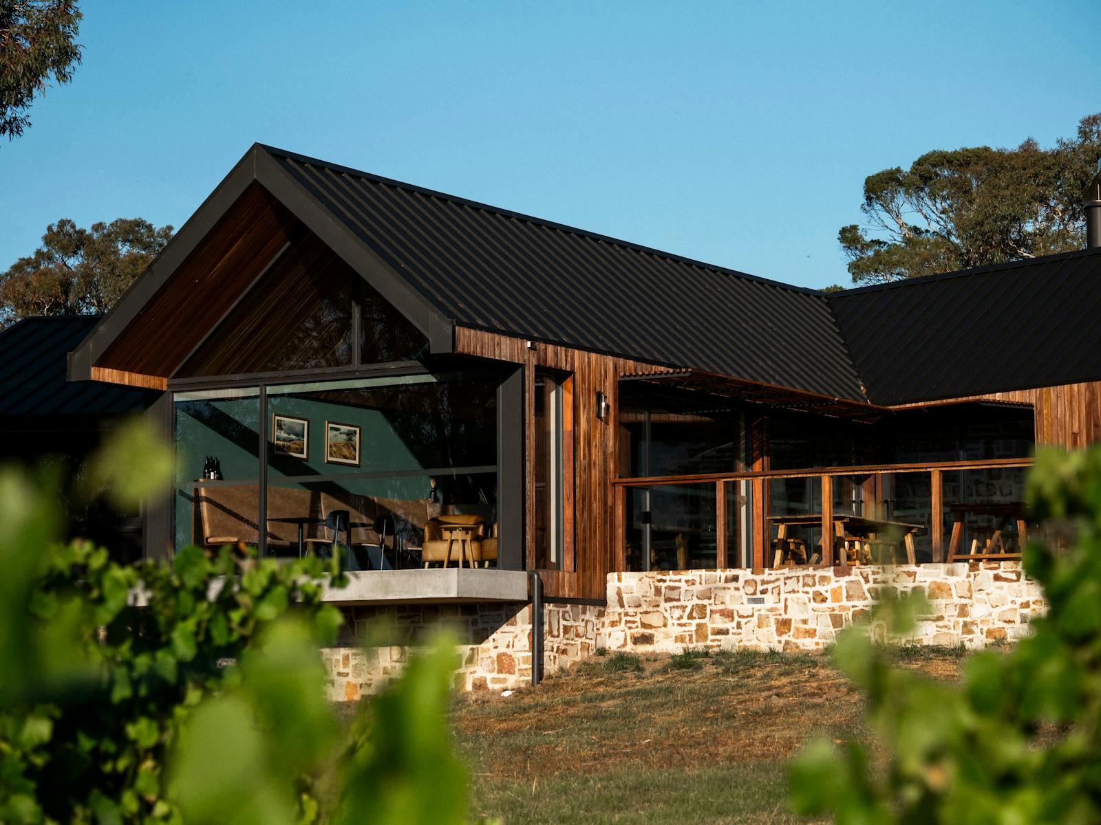 The Caledon Cellar Door with large windows and featuring sandstone taken from the property.