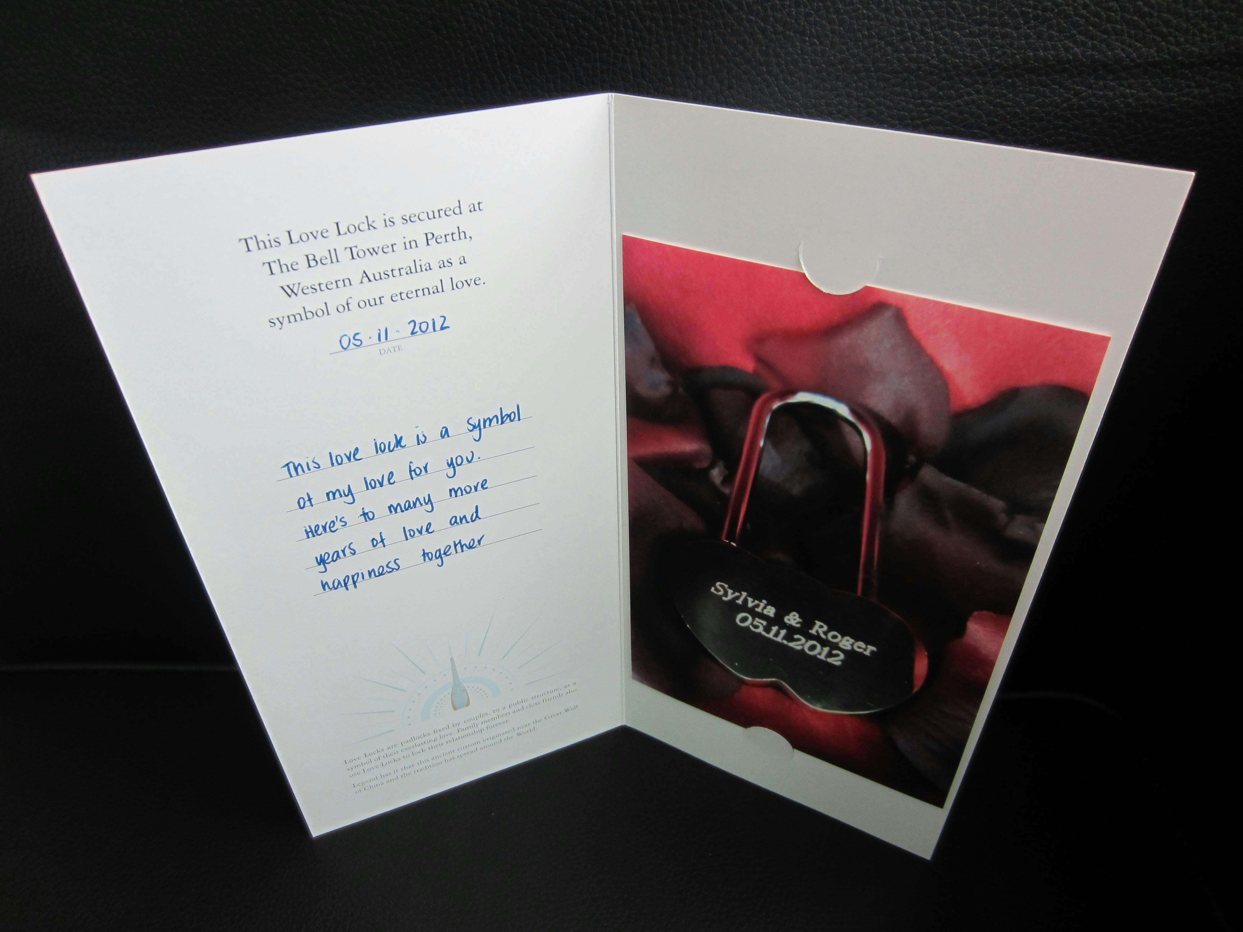 A Love Lock display, featuring a photo of a Love Lock in  folder