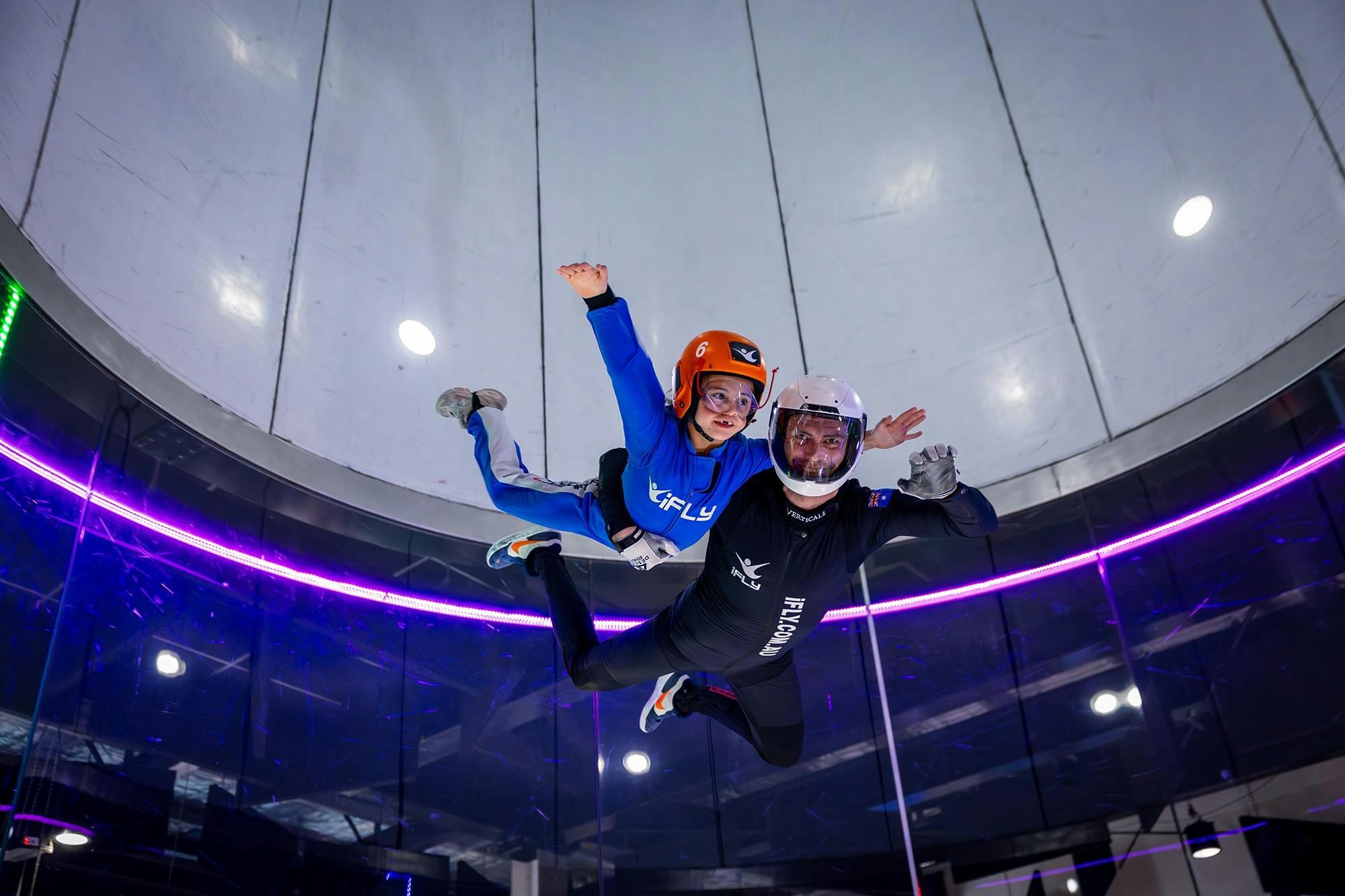 Instructor takes small kid for a high fly!