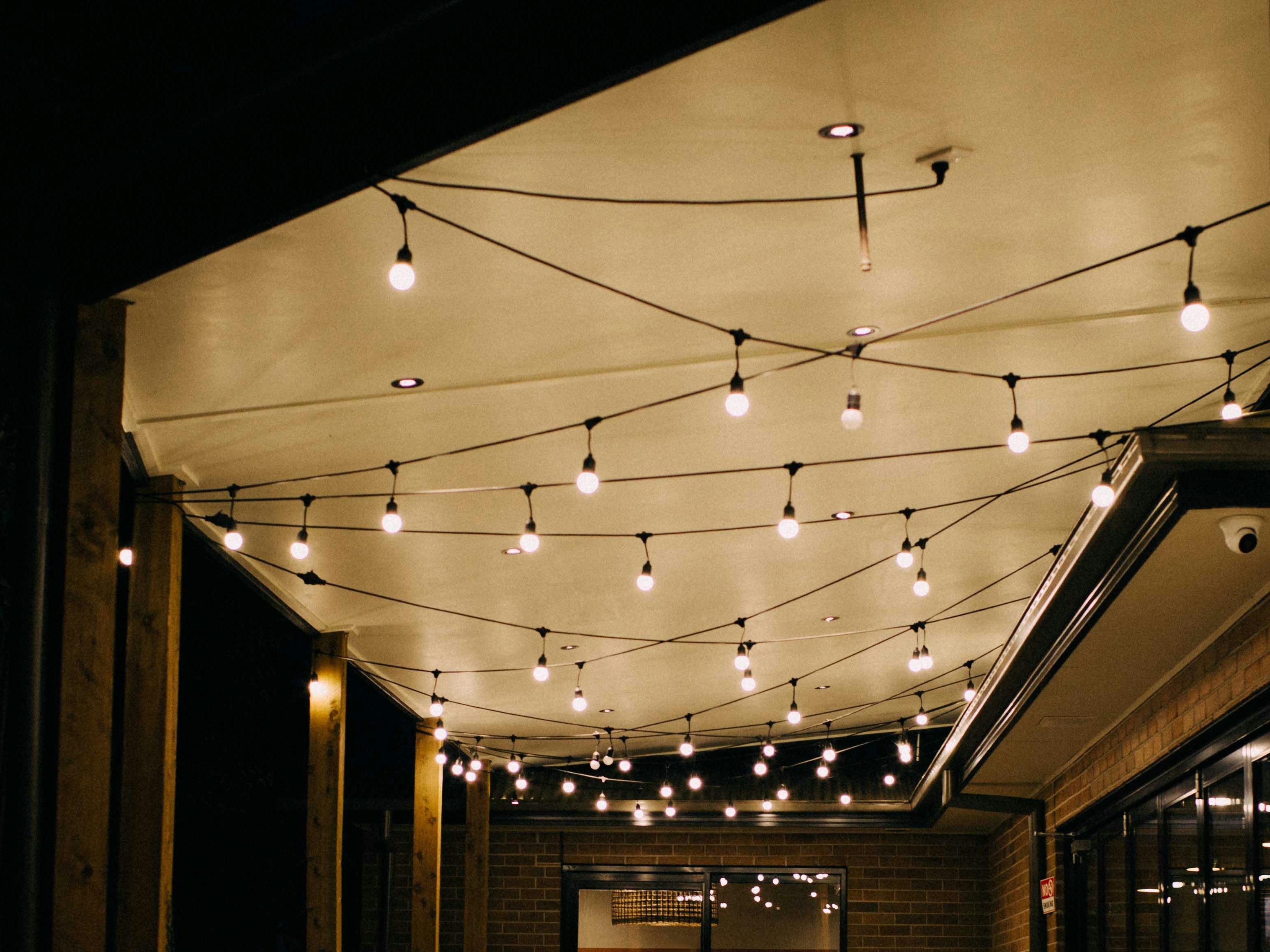 Festoon lights on ceiling of outdoor covered verandah