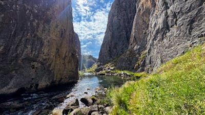 Looking down a limestone gorge with the dun shining through.