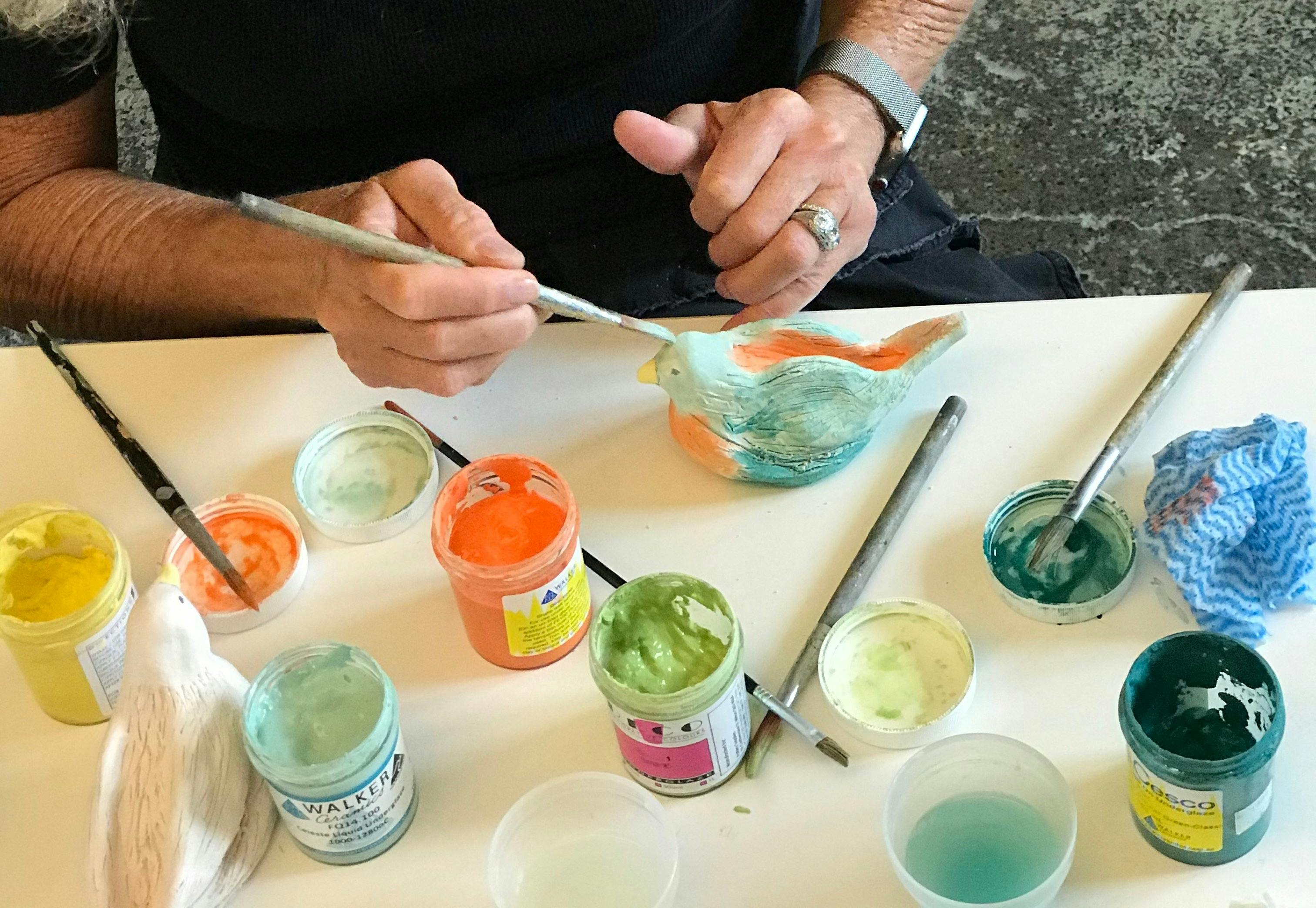 Painting your ceramic bird with glaze