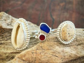 Shell, seaglass and pebble handmade rings at Swales Silver jewellery workshop