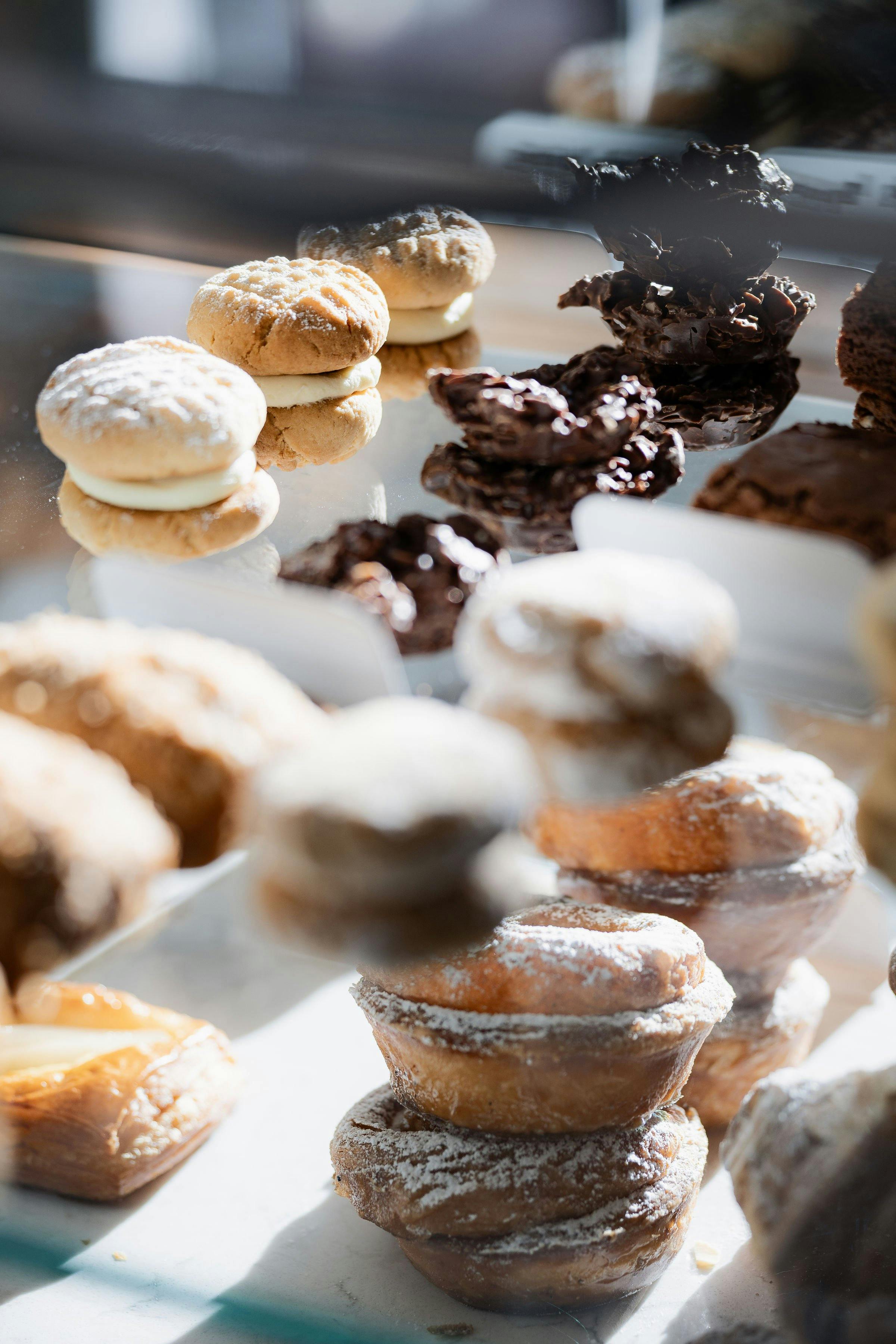 Baked goods in glass pastry case