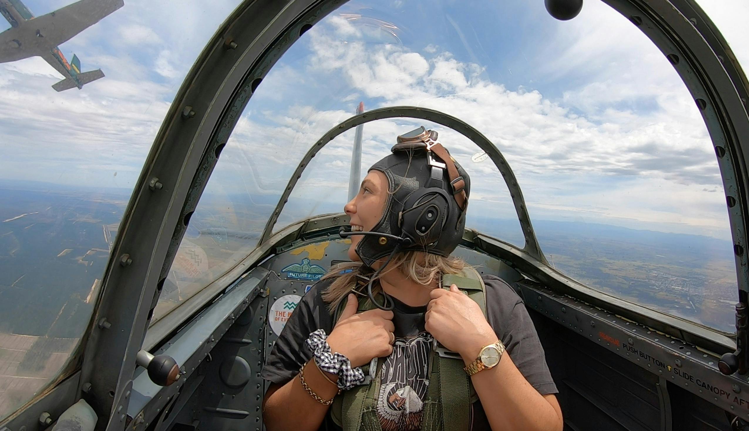 Passenger on combat flight looking through back window