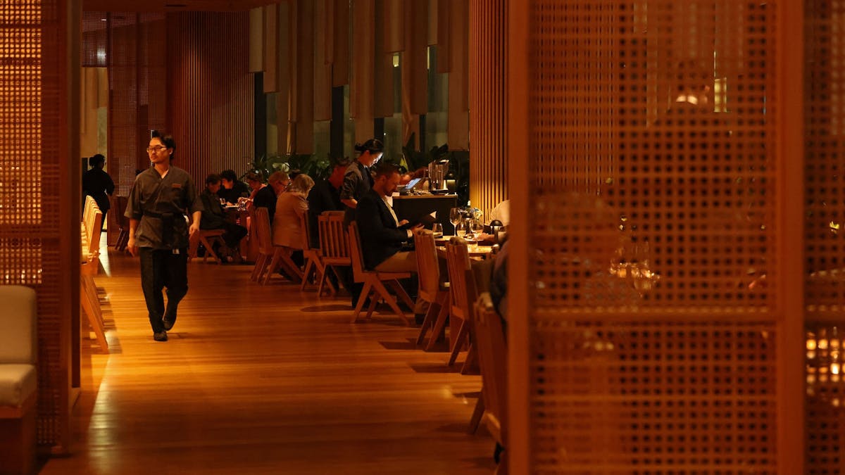 A moody restaurant interior at Sokyo