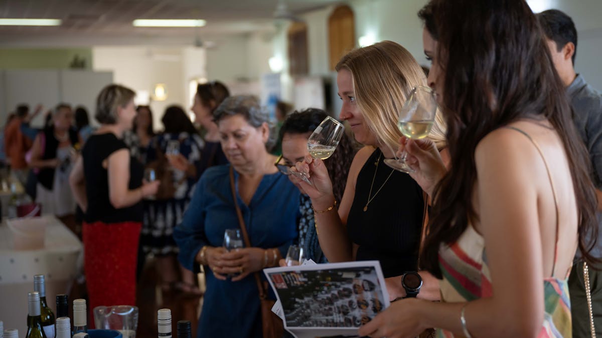 Young ladies trying wine