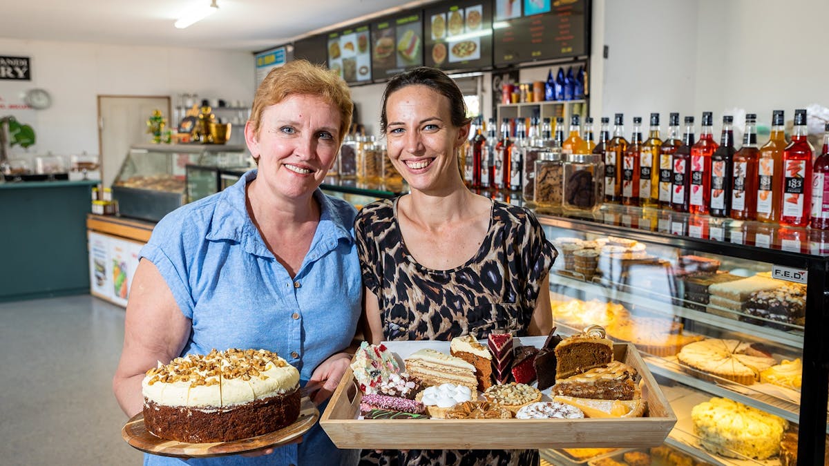 women standing in bakery