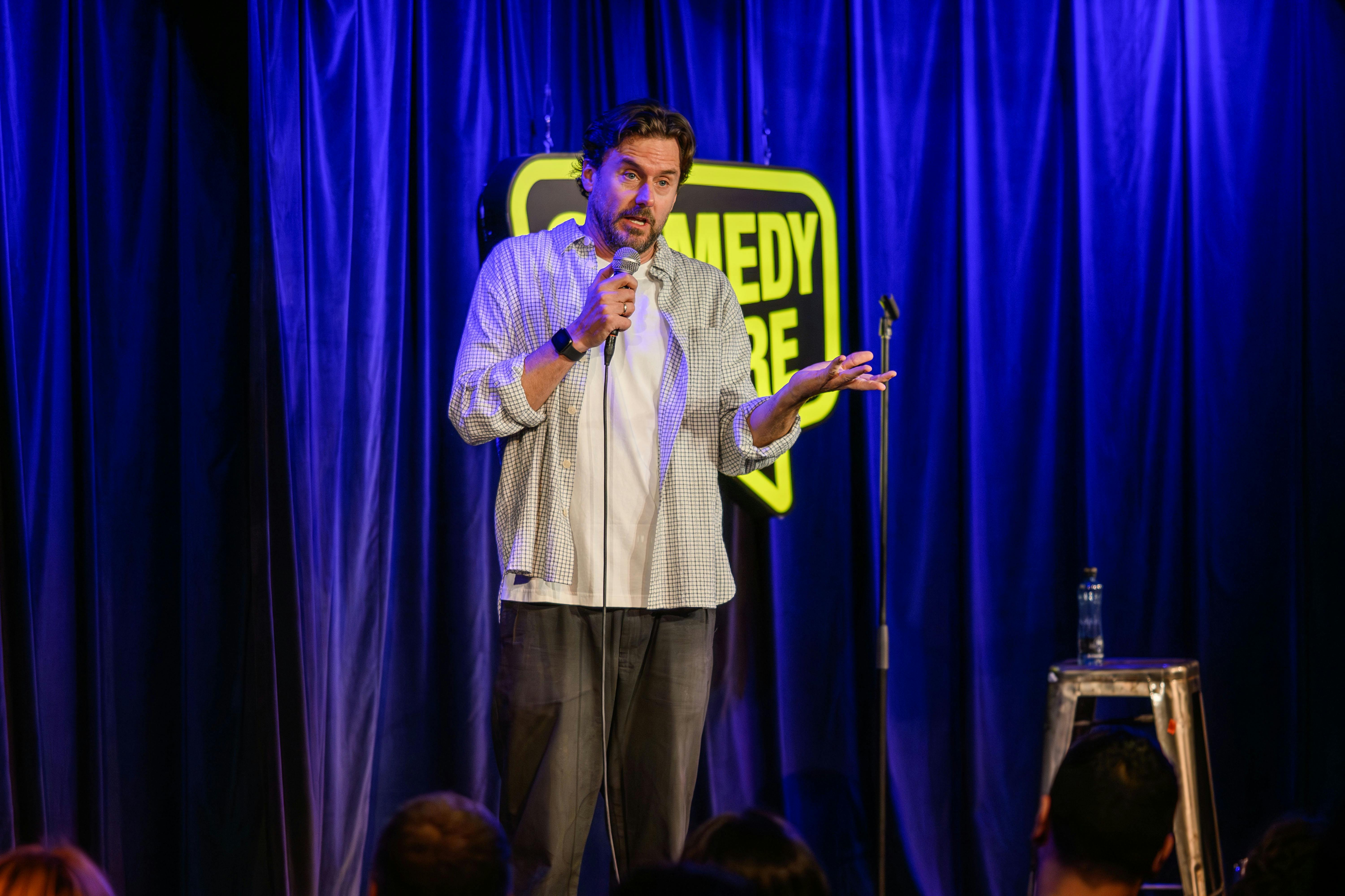 Australian comedian, Dave Thornton, on stage at the Comedy Store