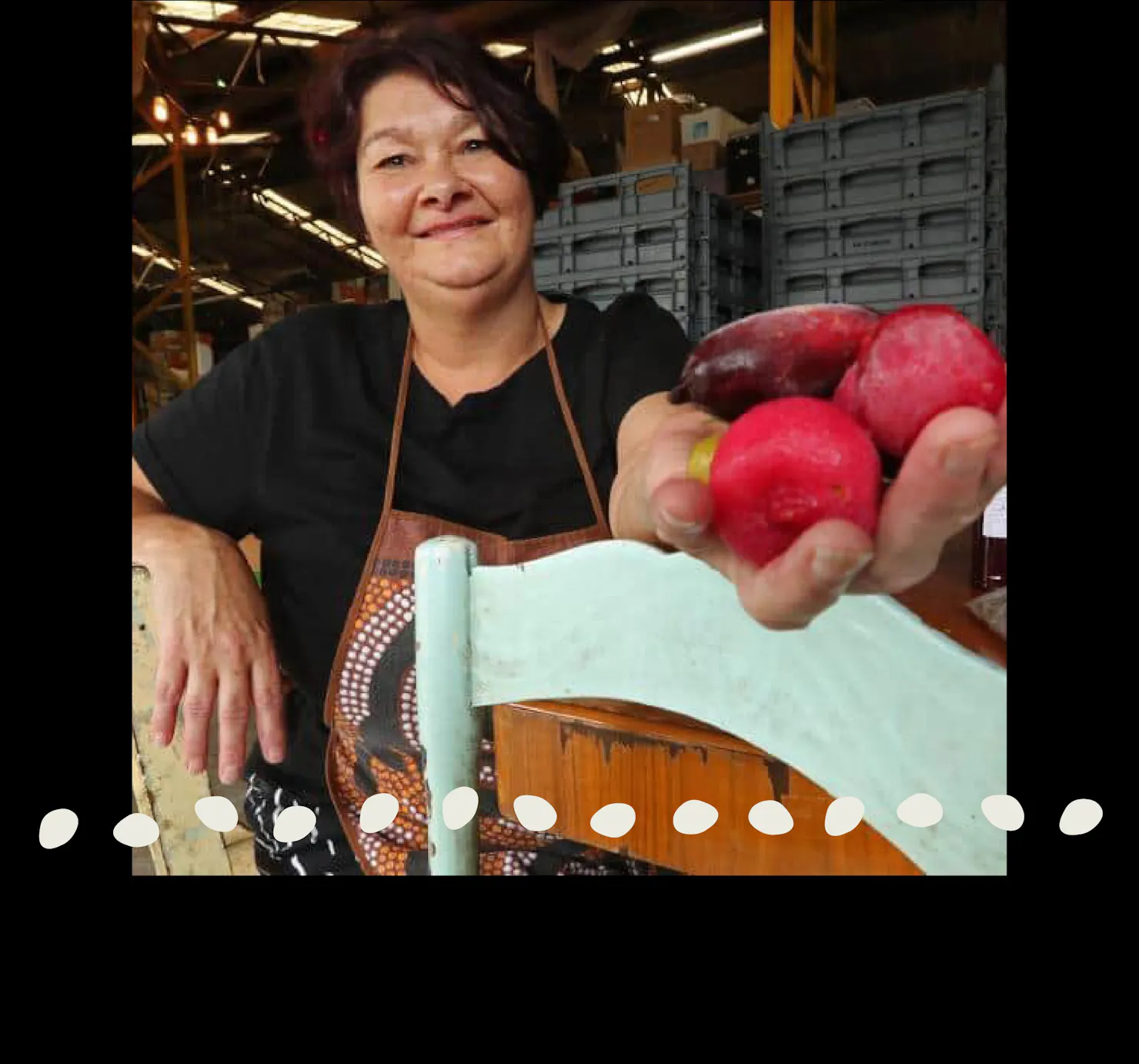 Aunty Dale Chapman holding Davidson Plum and Finger Lime