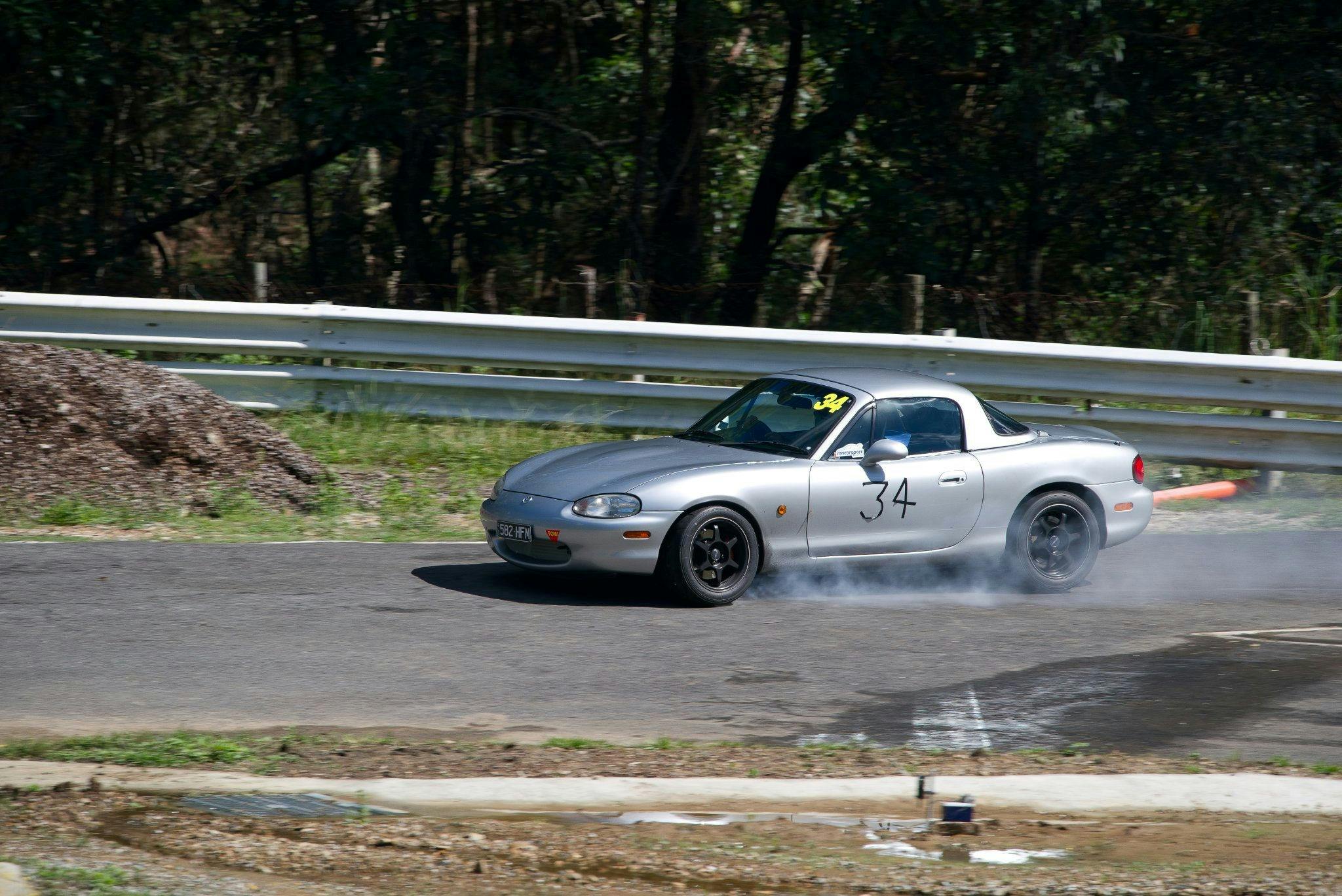 Tyre smoke from a locked front brake on a Mazda MX5  into the hairpin from the second loop descend