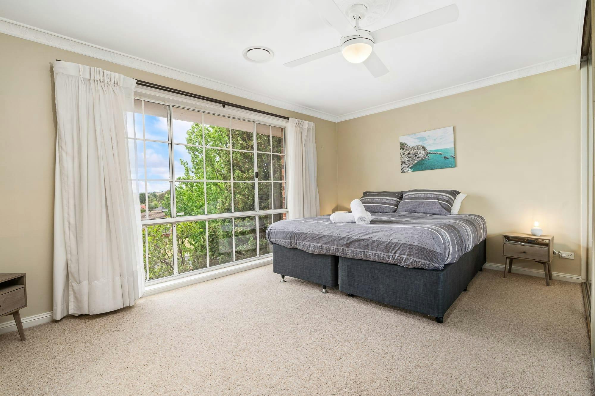 King bed with large window and views