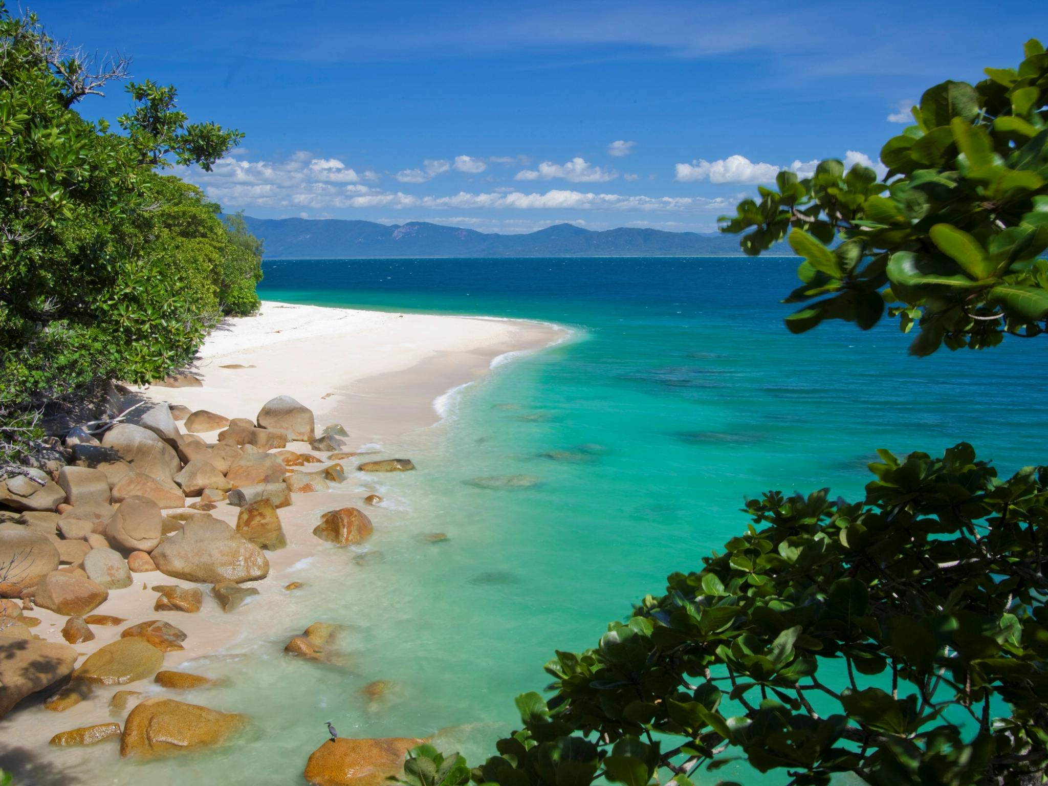 The pristine white sands and turquoise waters of Nudey Beach at Fitzroy Island, Great Barrier Reef