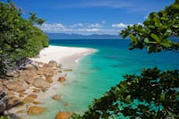 The pristine white sands and turquoise waters of Nudey Beach at Fitzroy Island, Great Barrier Reef