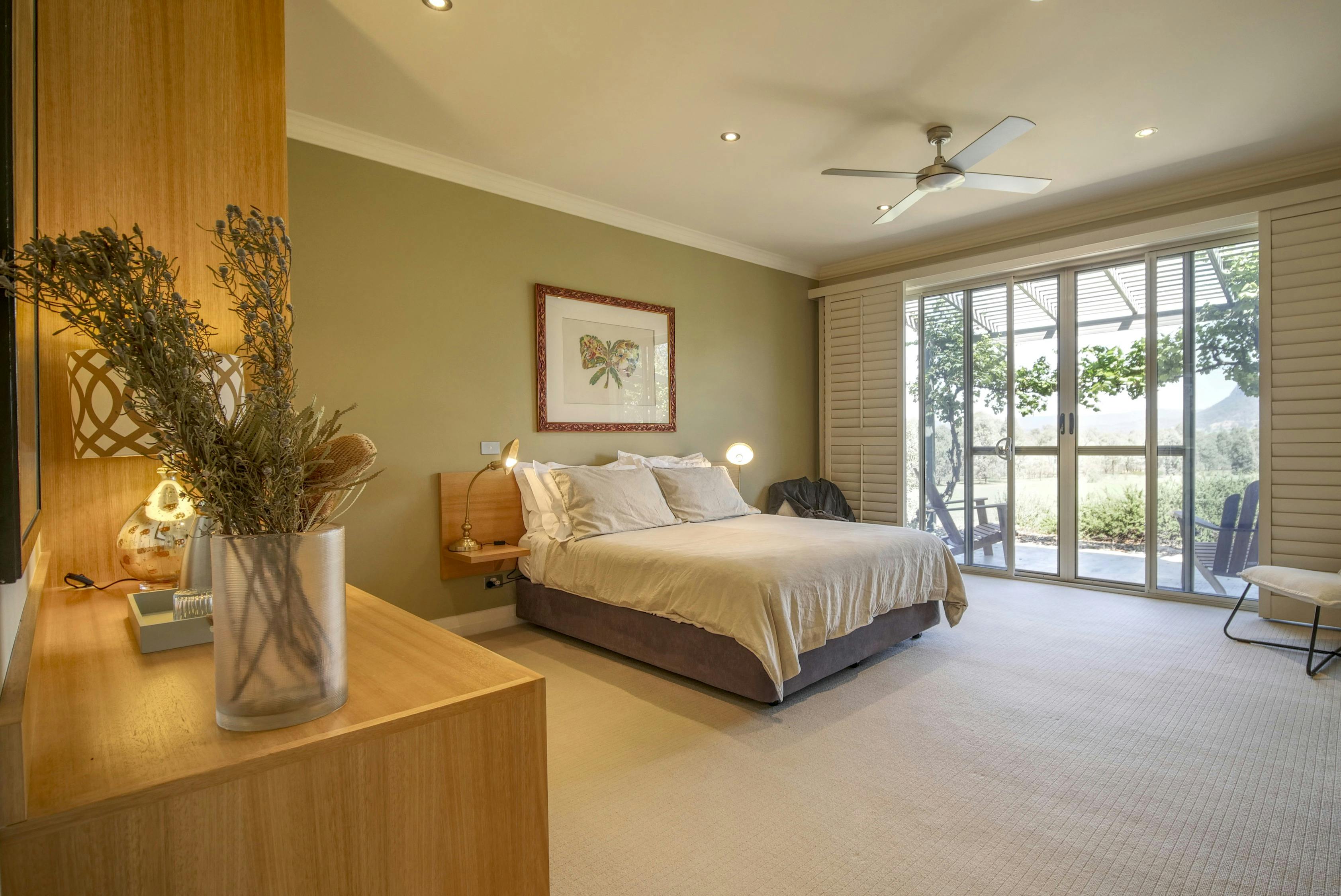 Queen bedroom with terrace facing Mount Marsden