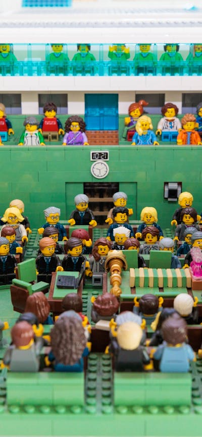 Plastic toys seated in various positions