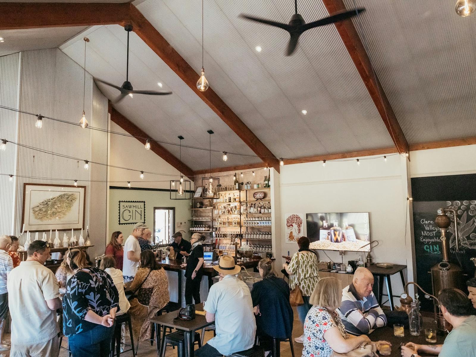 Guests enjoy the atmosphere at the bar