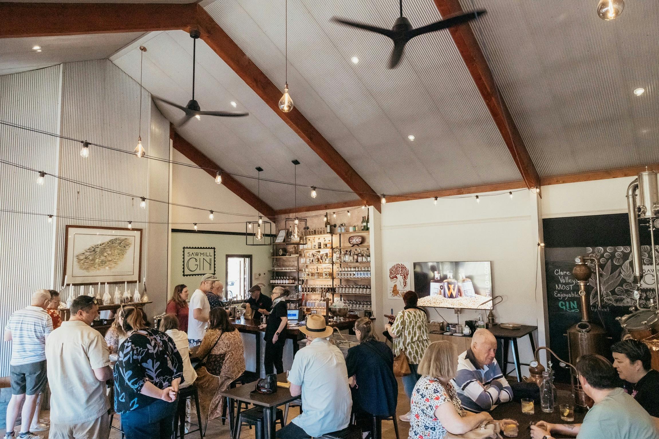 Guests enjoy the atmosphere at the bar