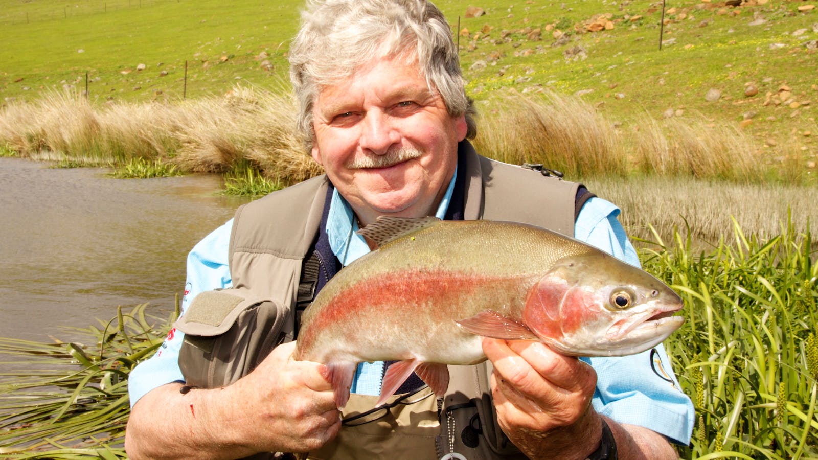 Our Fly Fishing guide, Ken Orr with a beautiful Rainbow Trout