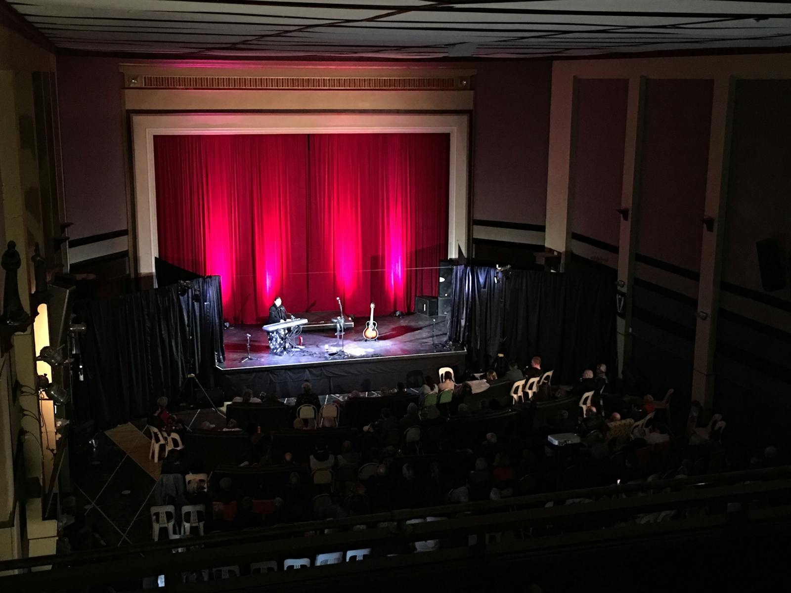A live stage music performance. Image taken from the dress circle seating area.