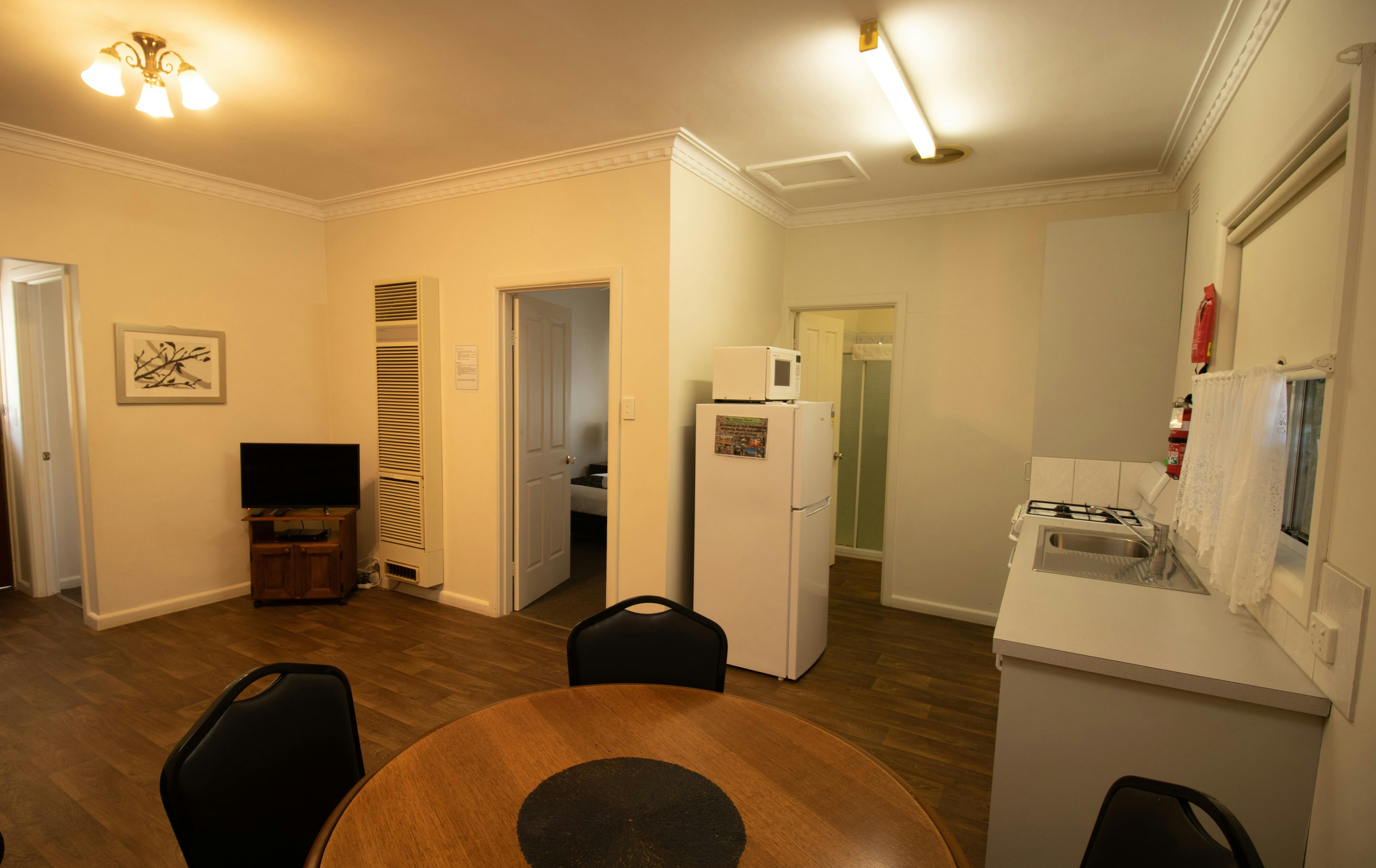 Unit 3 Living Room, TV, Kitchenette, Dining Table & Seats