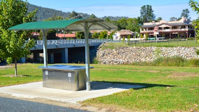 Barbeque area at Caravan park entrance, looking over creek towards the Royal Hotel