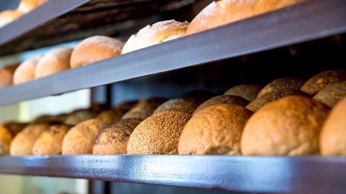 bread rolls in a bakery rack