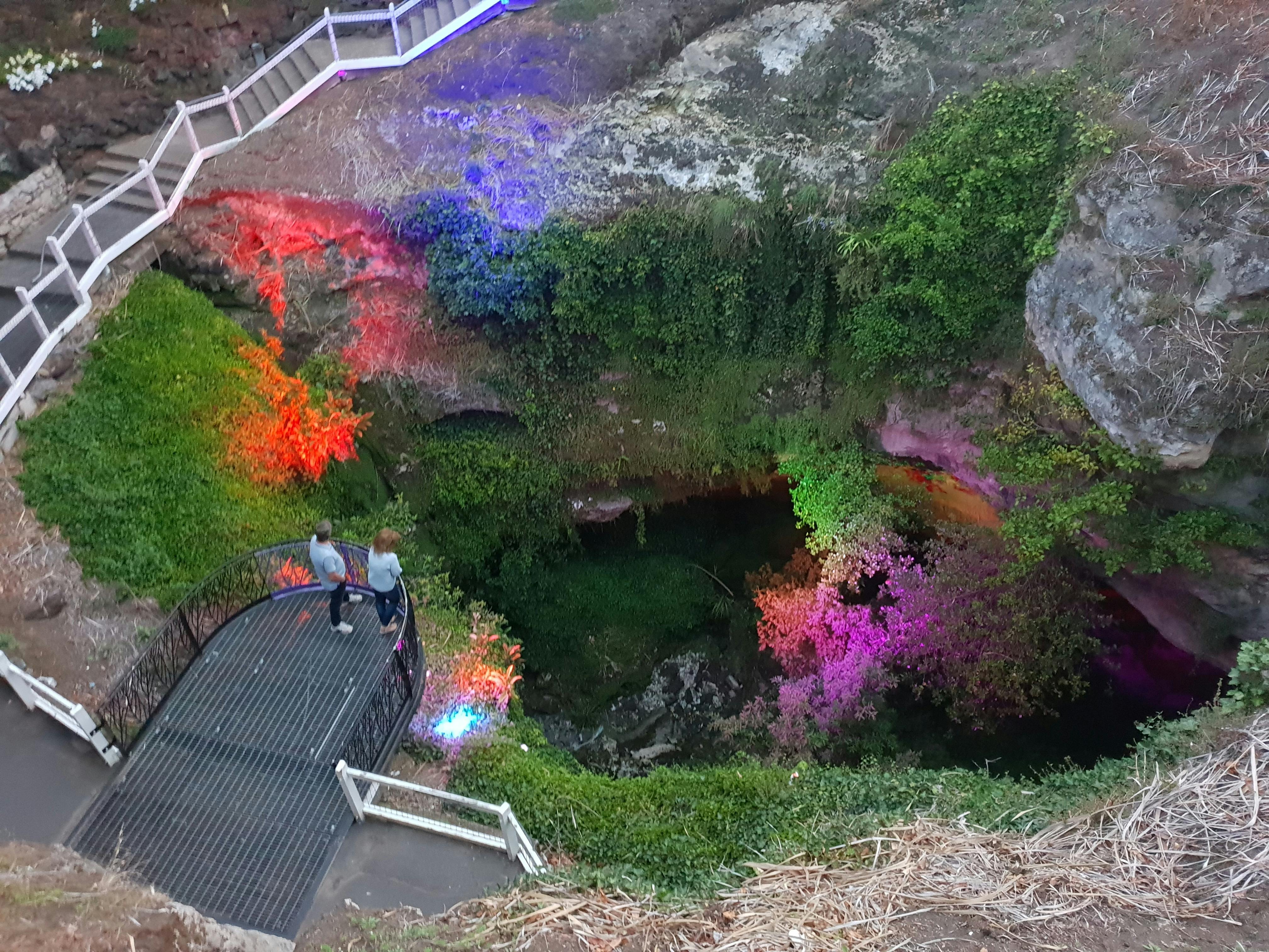 Cave Gaedens lit up at night different colour lights