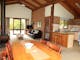 All four cottages have the same layout with spacious lounge-dining with flat screen television