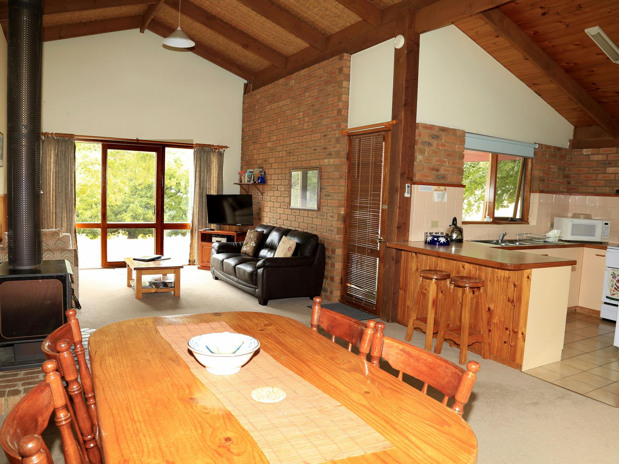 All four cottages have the same layout with spacious lounge-dining with flat screen television