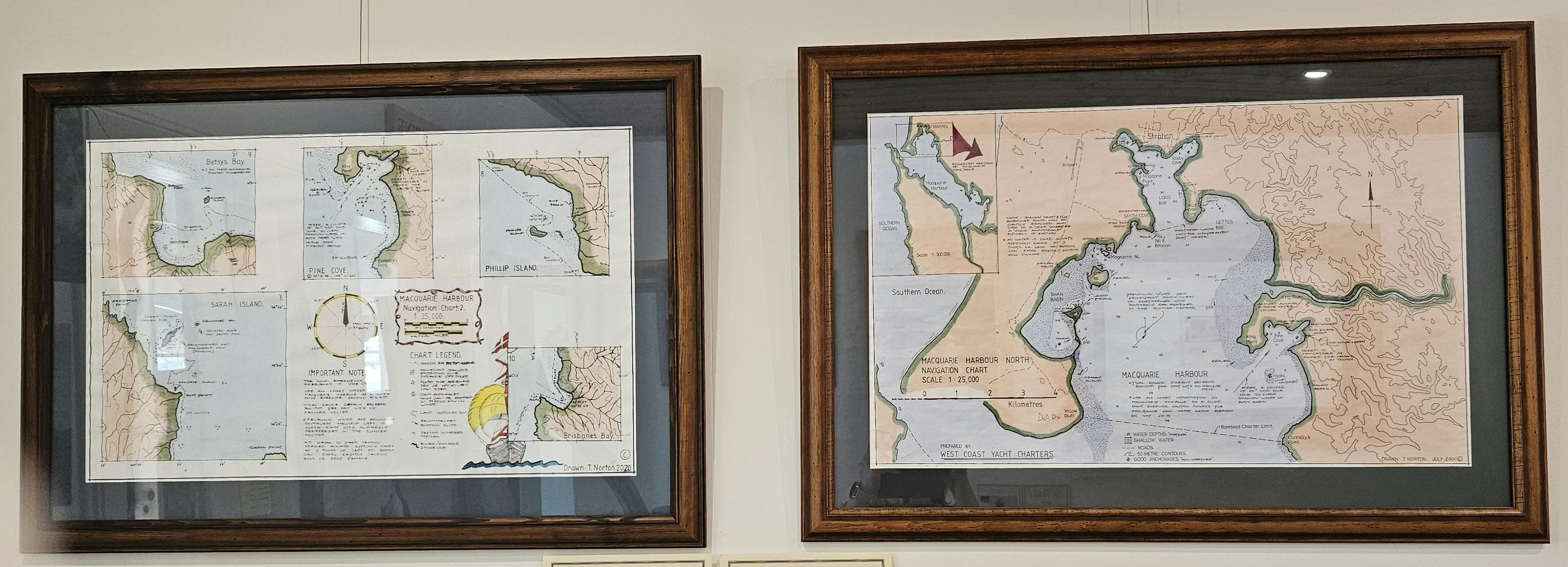 Two framed maps of Macquarie Harbour