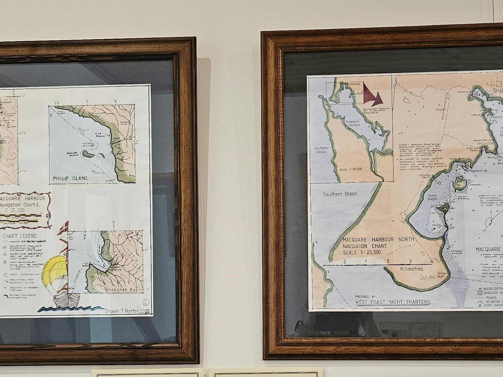 Two framed maps of Macquarie Harbour