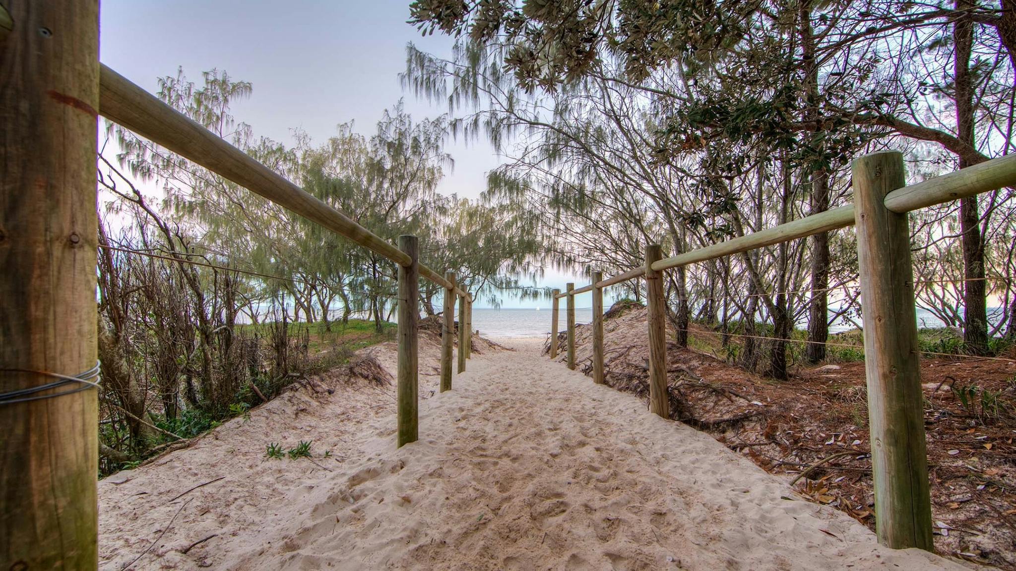 Entry walkway to beach at dusk