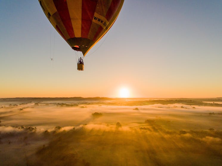 Balloon flight at sunrise