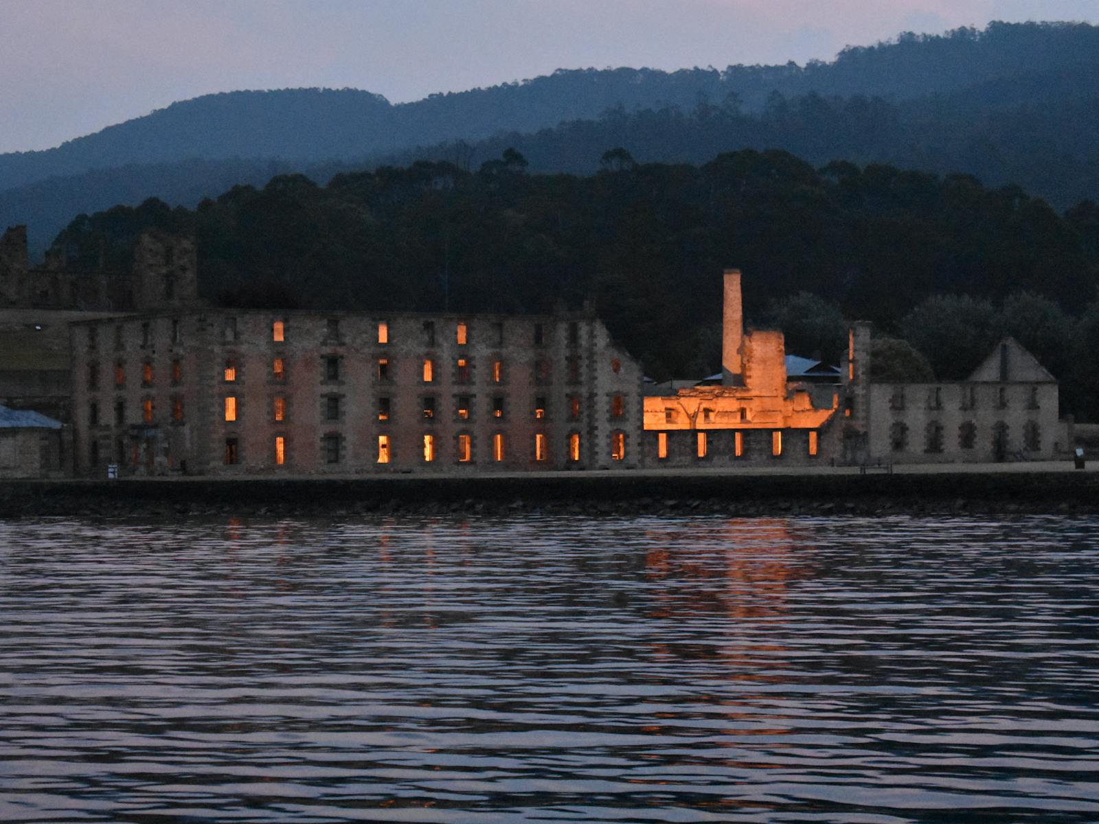 Unique indeed. Historic Port Arthur lit up at night from the deck of the Lady Nelson