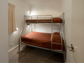 Double bed with Single bunk in our wheelchair accessible cabin