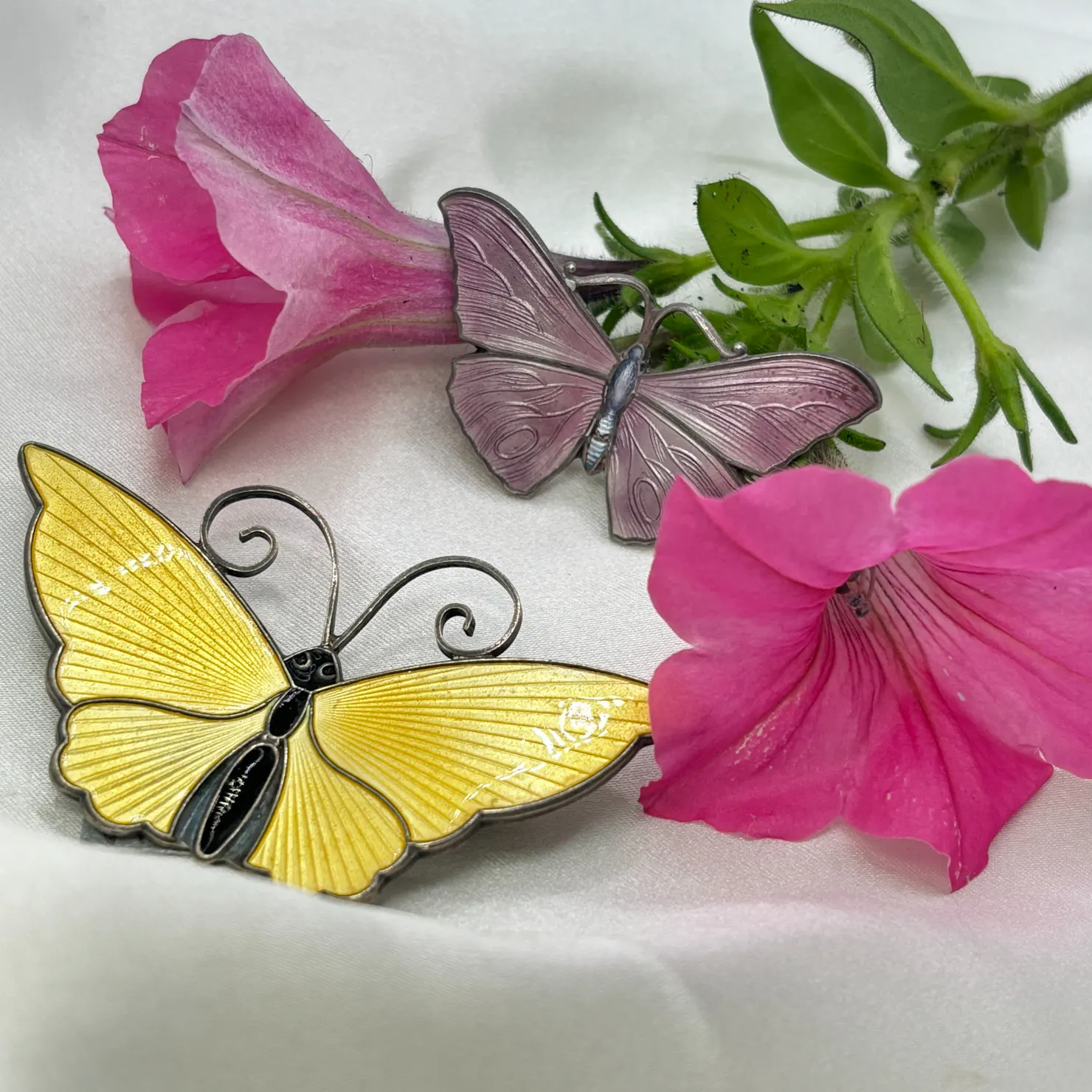 Brooches in the shape of butterflies