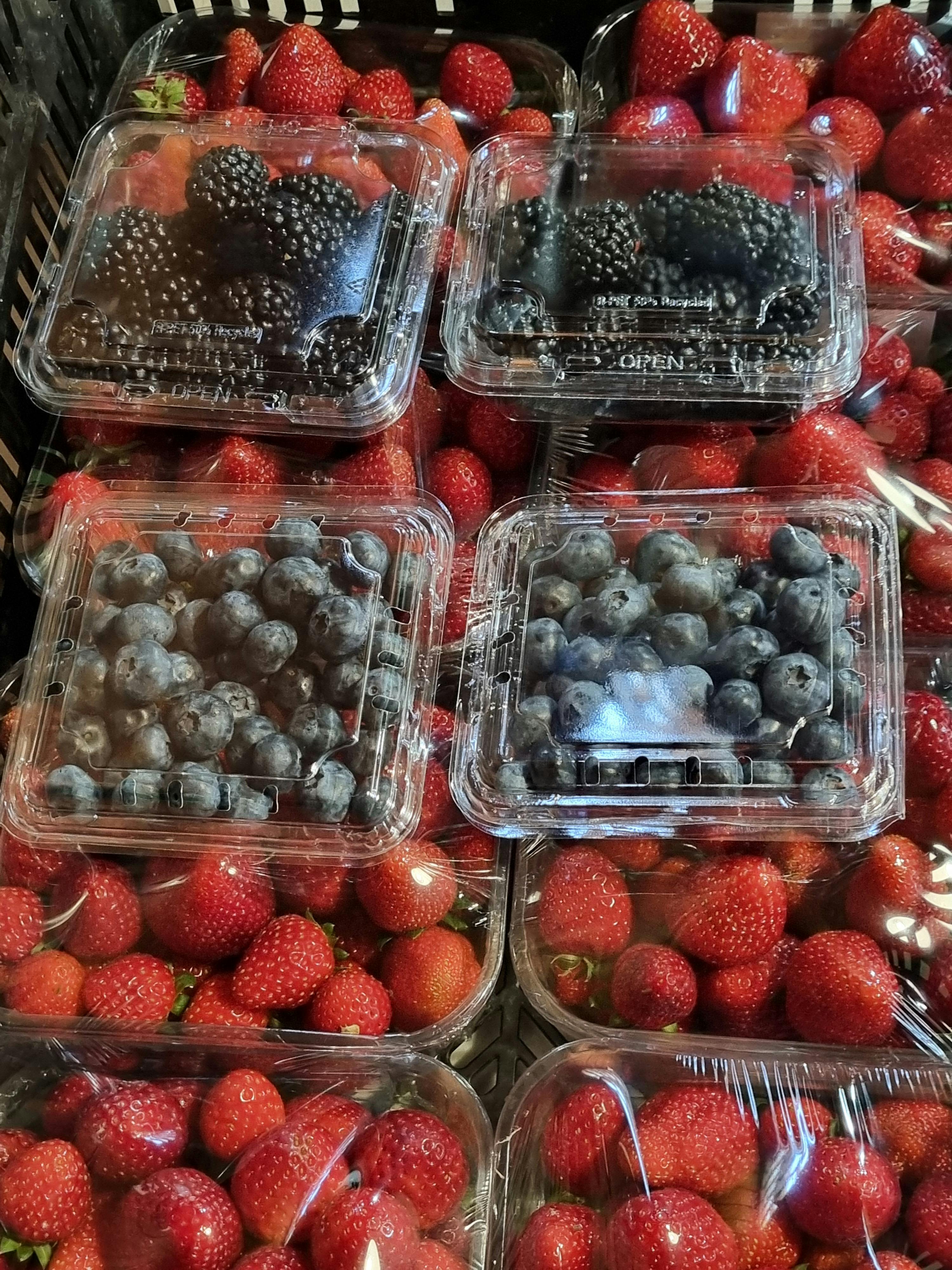 Blueberries and strawberries in punnets