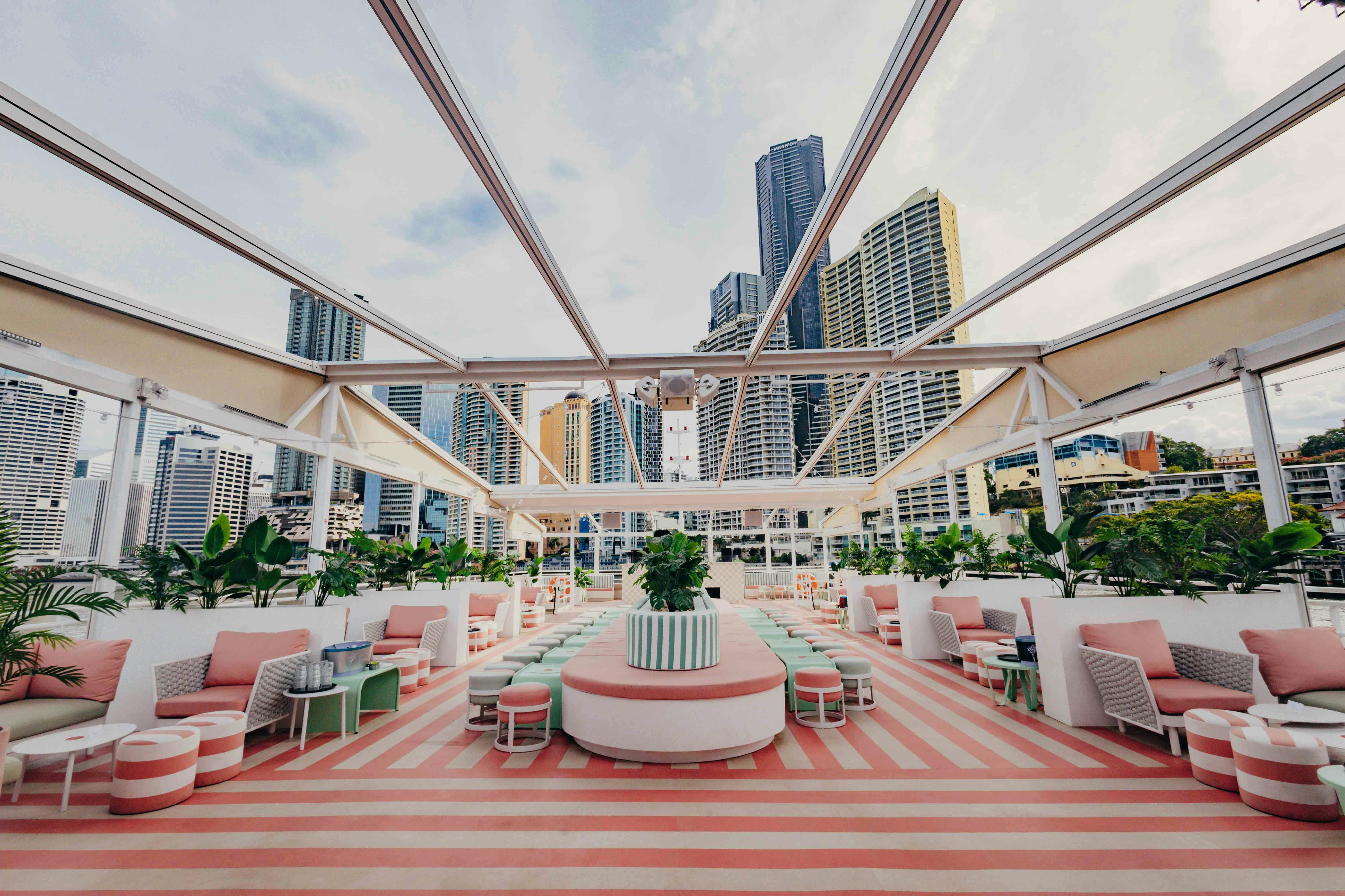 Sun-soaked rooftop vibes, DJs spinning, cocktails flowing, and skyline views on OASIS Top Deck.