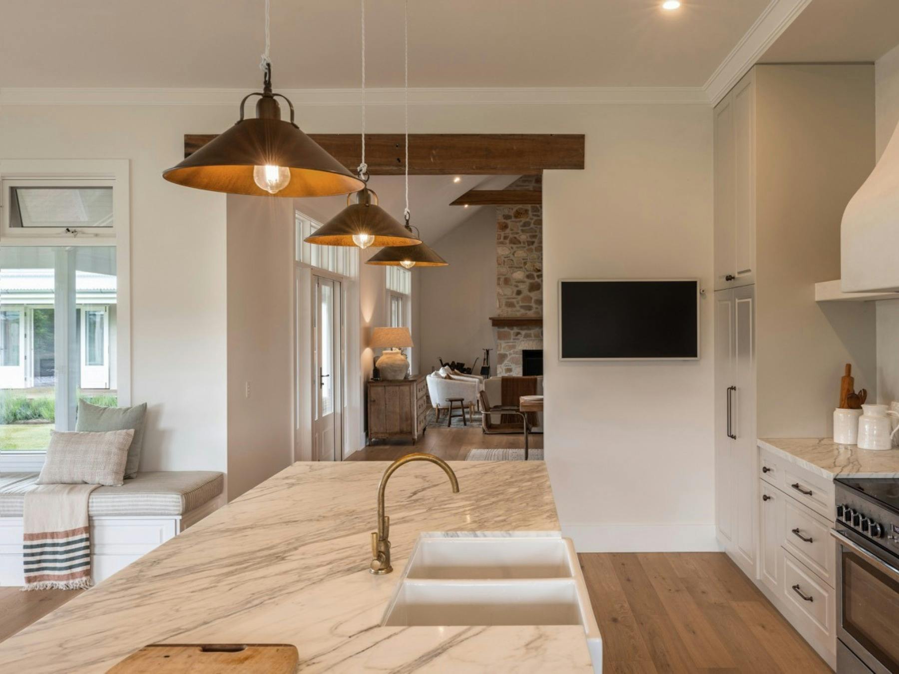 Marble kitchen with premium finishes and open plan layout at Stonehaven Estate