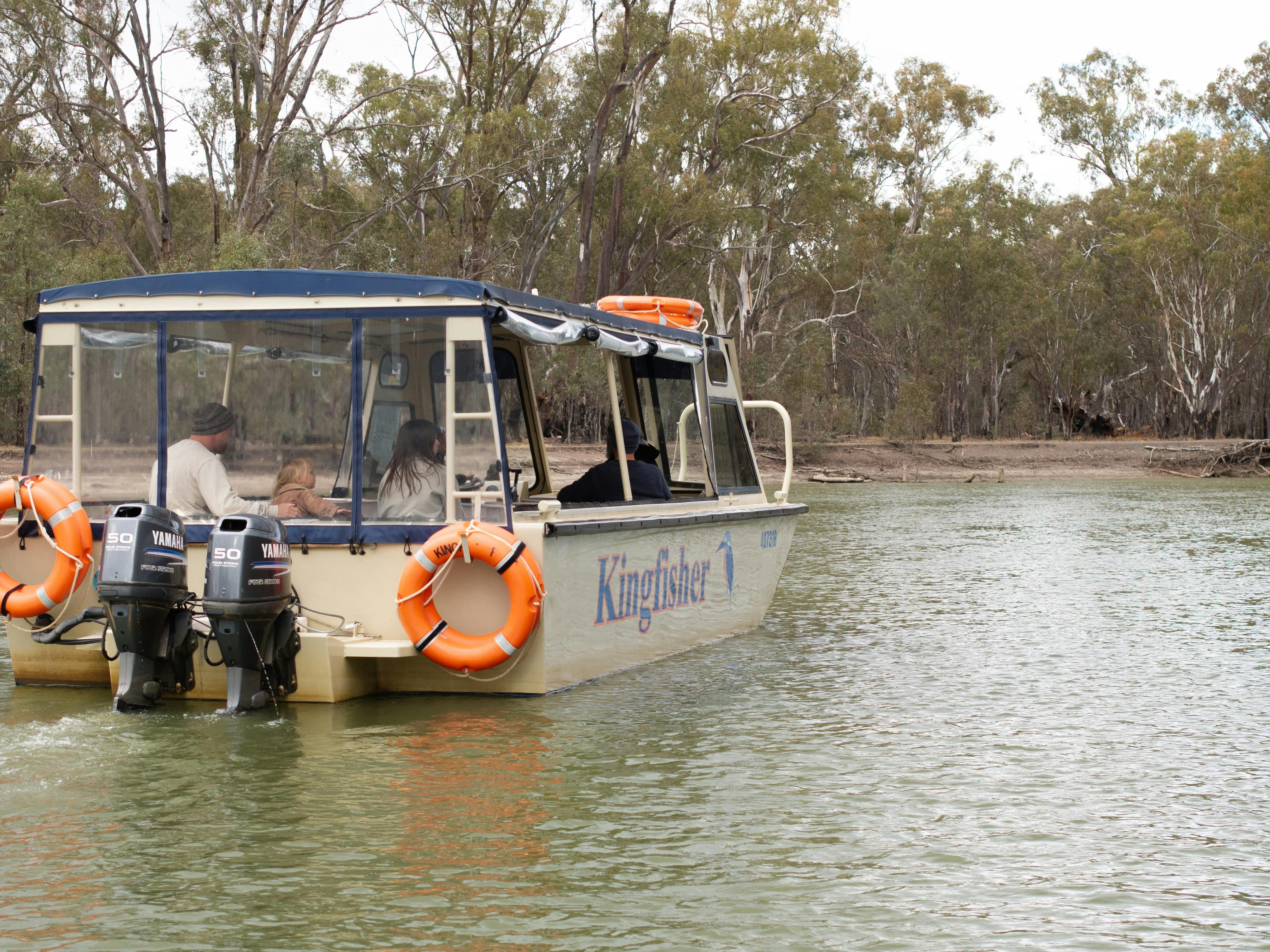 The Kingfisher boat cruising the Murray through Barmah Forest wetlands.