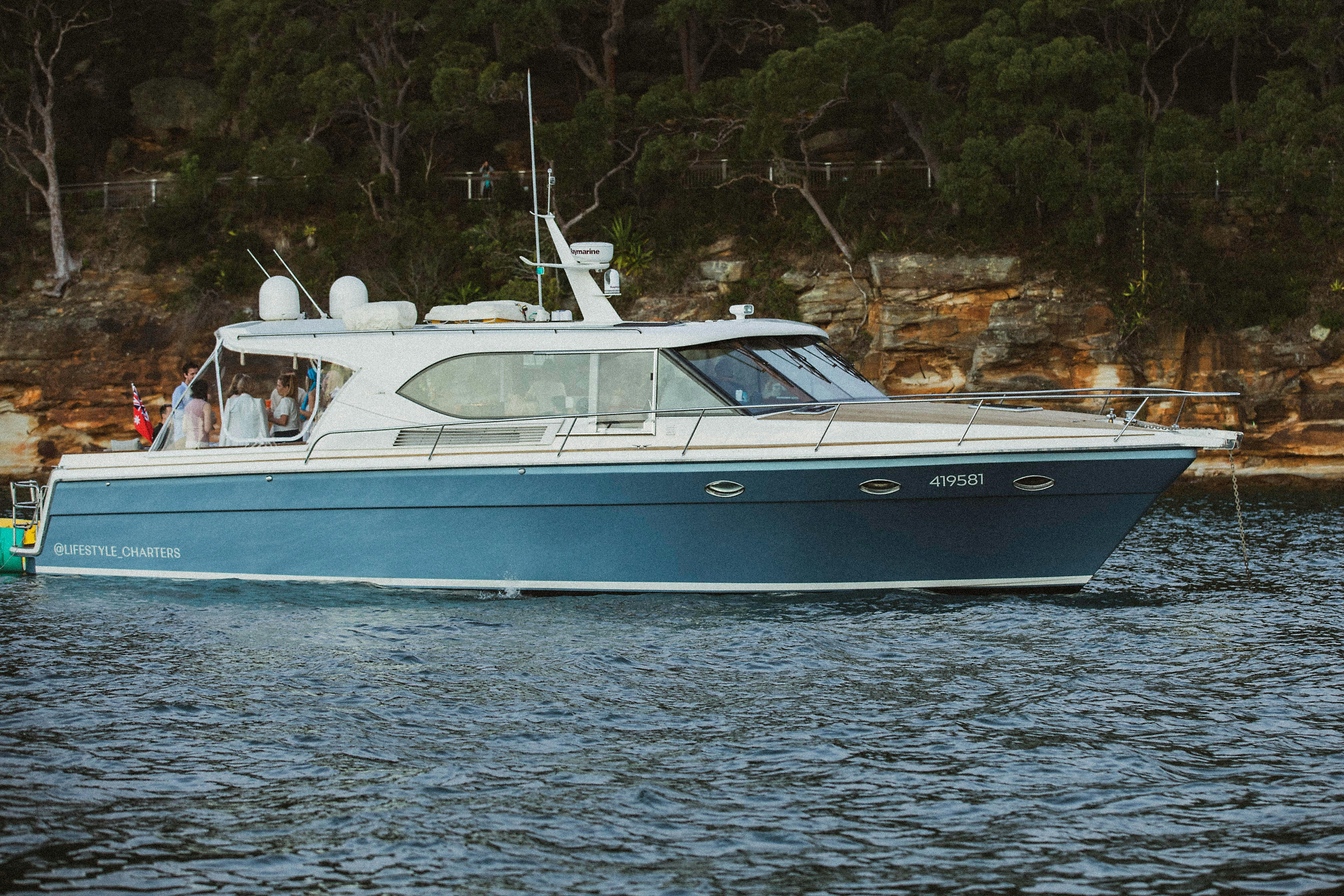 Blue boat on sydney harbour